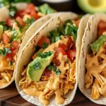Slow Cooker Queso Chicken Tacos
